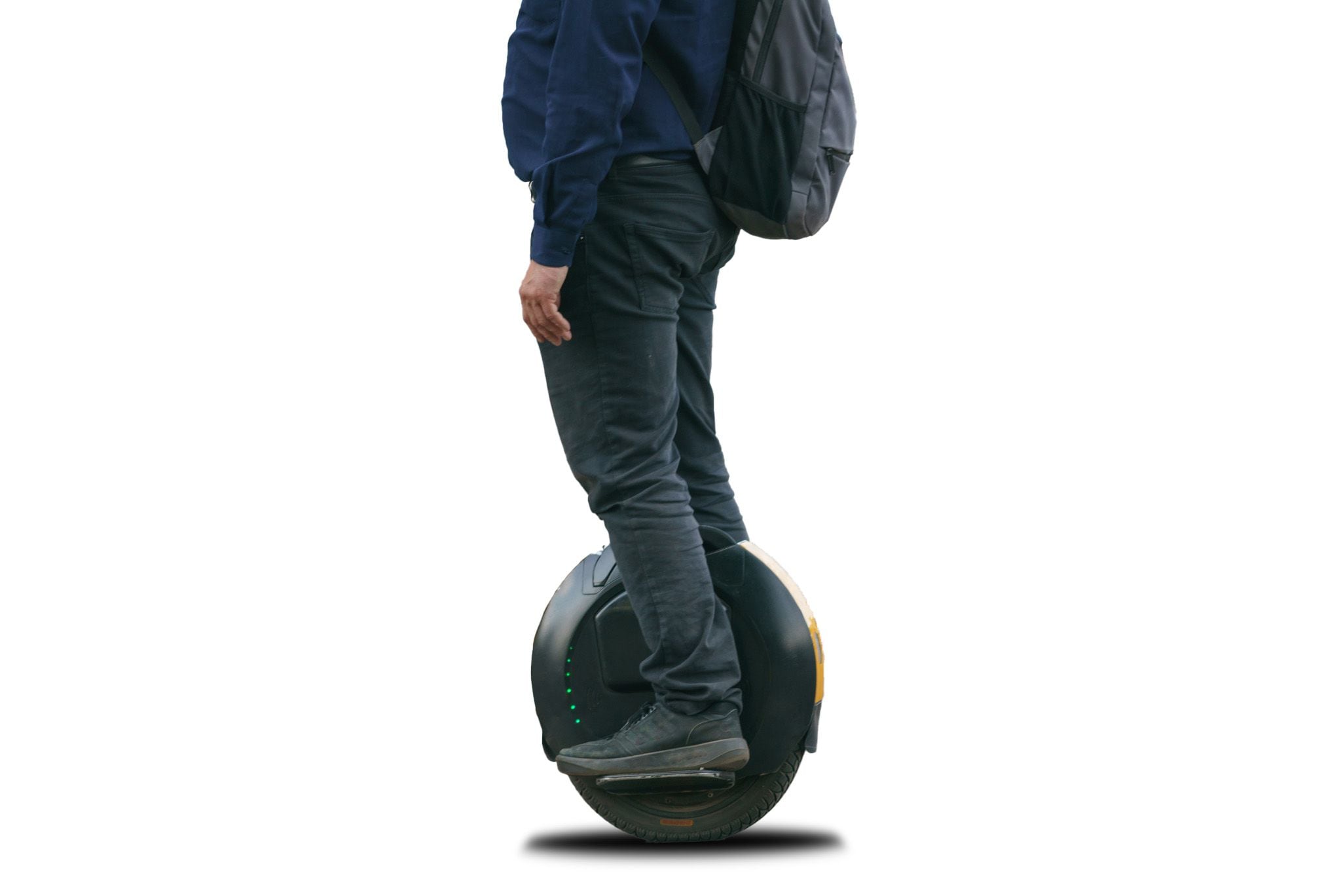 Person standing on a single wheeled device